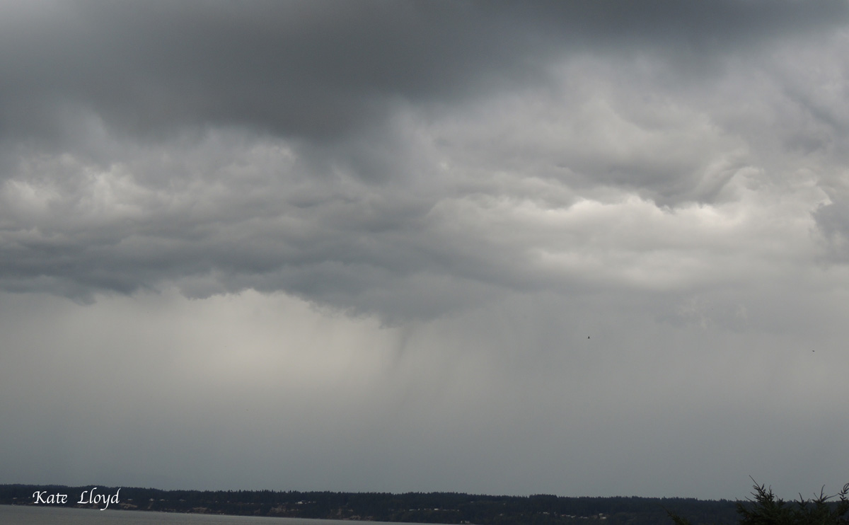 Glowering clouds threatened another storm, but receded.