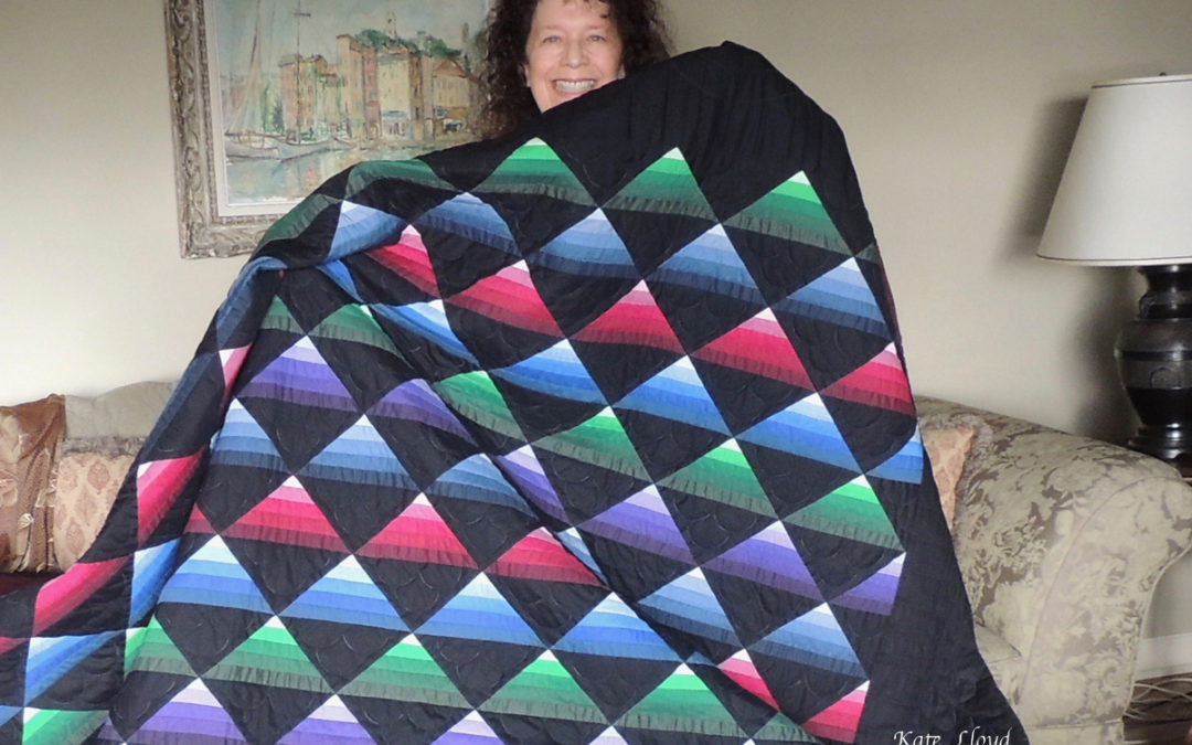 Woo-hoo and hurray! I found my quilt winner!