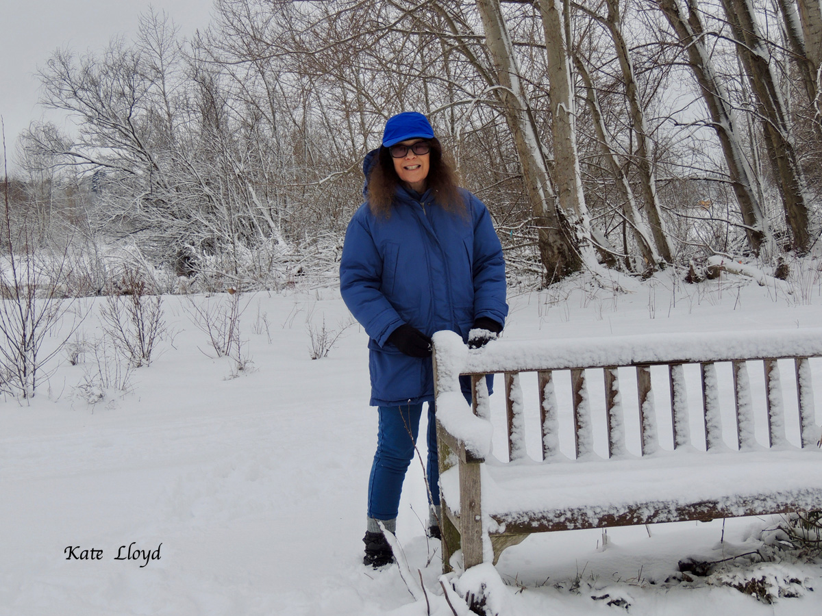 Pausing to catch my breath during a brisk walk in the pristine snow.