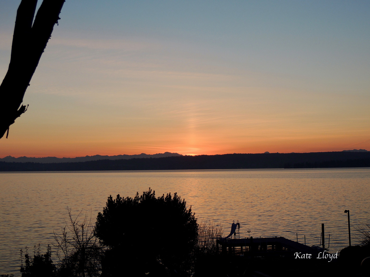 Sunrise taken across Lake Washington toward the Cascade Mountains.