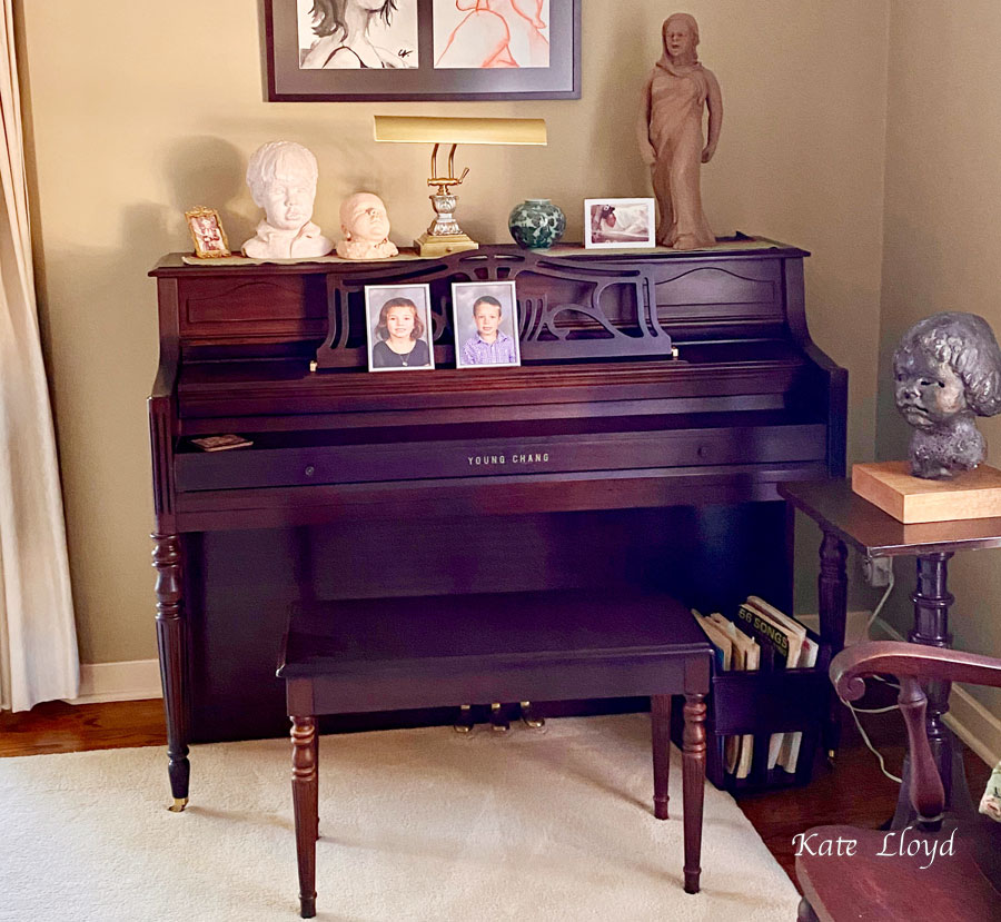 Our piano has turned into a photo stand. 