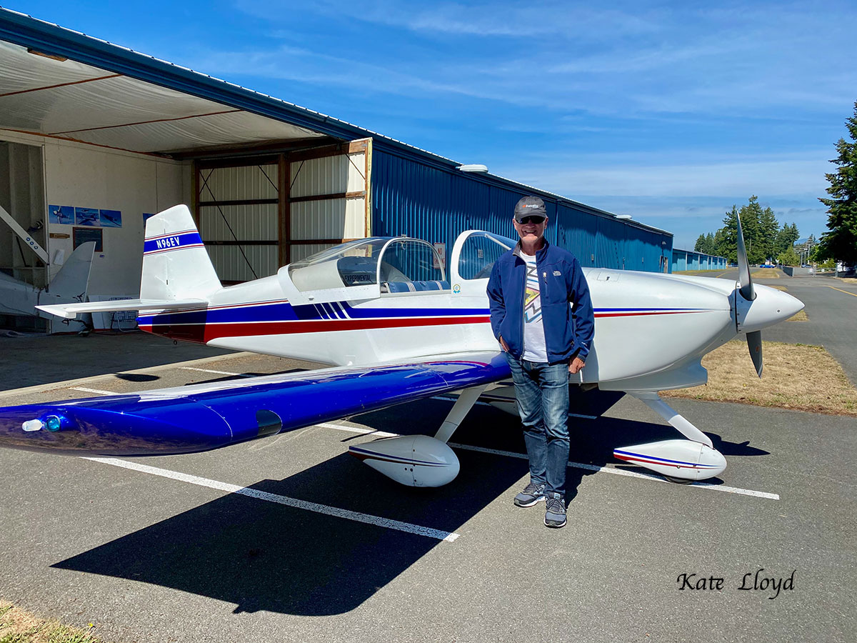 My husband, with his plane.