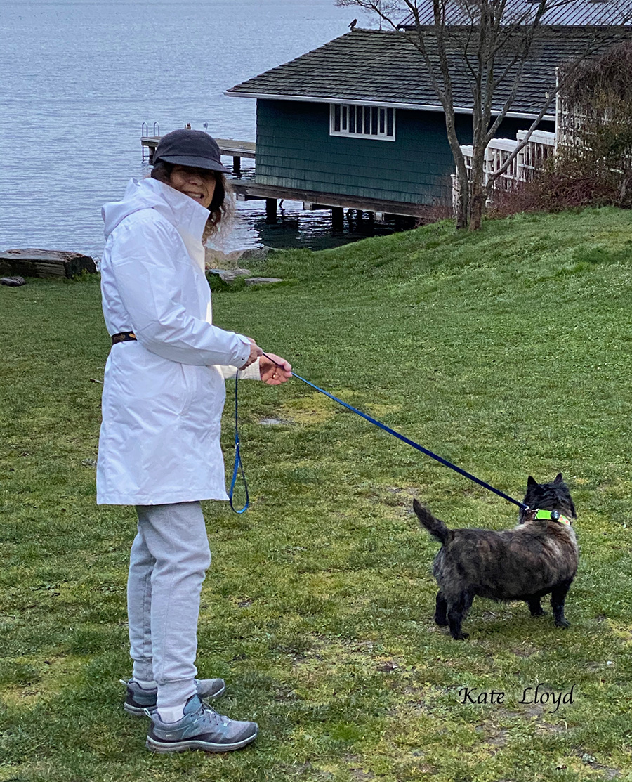 The ducks in the water catch Piper's attention far more than the camera.